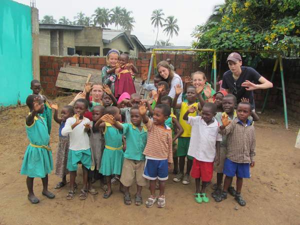 Canford pupils with primary school pupils in Ghana